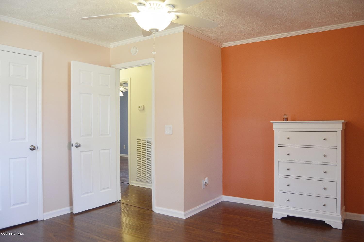 313 North Hampton Road Wilmington, NC 28409 - Photo 10 of 22 ROOMY Master Bedroom with private Bath and walk-in closet.