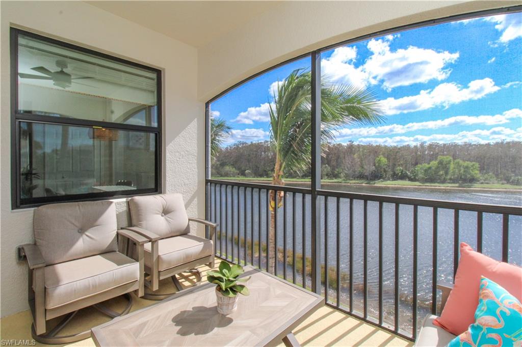 9554 Trevi Court, Unit 4737 Naples, FL 34113 - Photo 38 of 49 a balcony with furniture and a potted plant