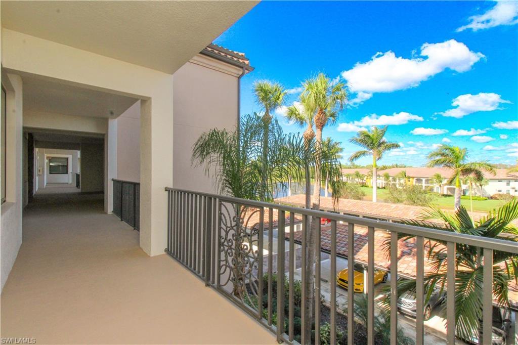 9554 Trevi Court, Unit 4737 Naples, FL 34113 - Photo 5 of 49 a view of balcony with wooden floor