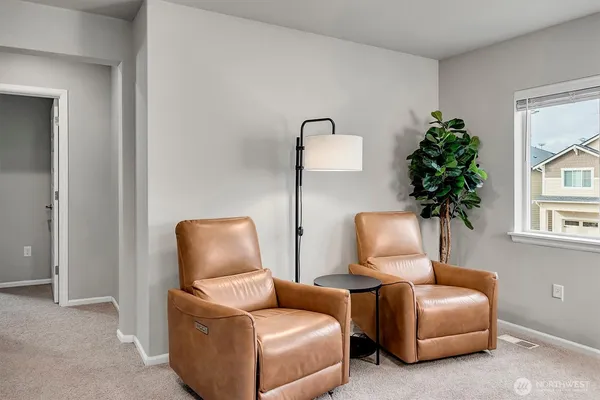 a room with furniture and a window