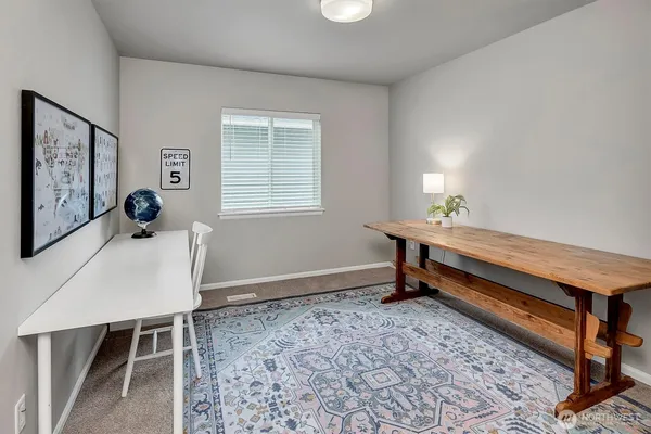 a room with furniture and window