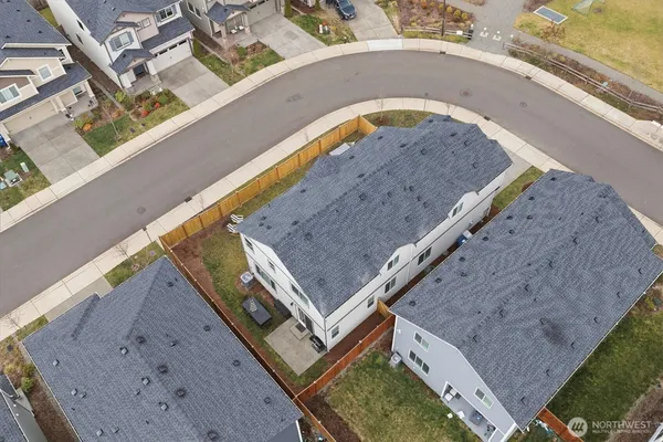 a view of a swimming pool with outdoor seating