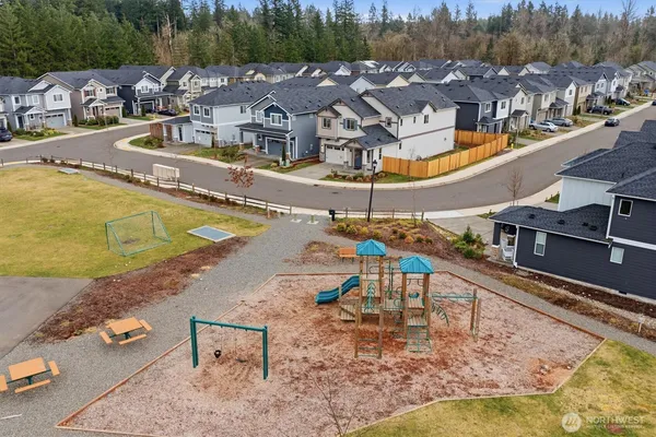 a view of a fountain in front of a lake