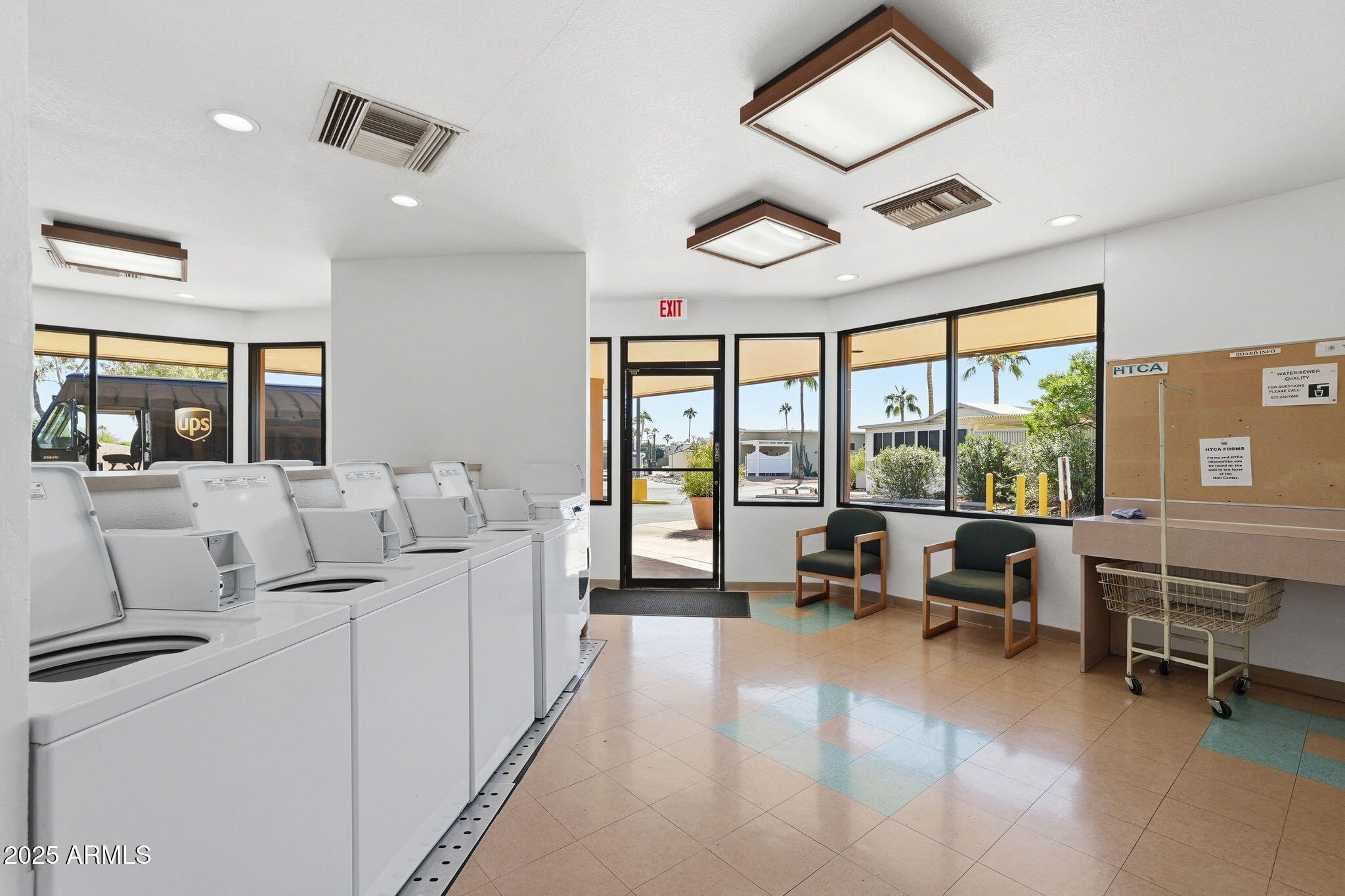 17200 West Bell Road, Unit 1270 Surprise, AZ 85374 - Photo 11 of 15 a living room with furniture and large windows