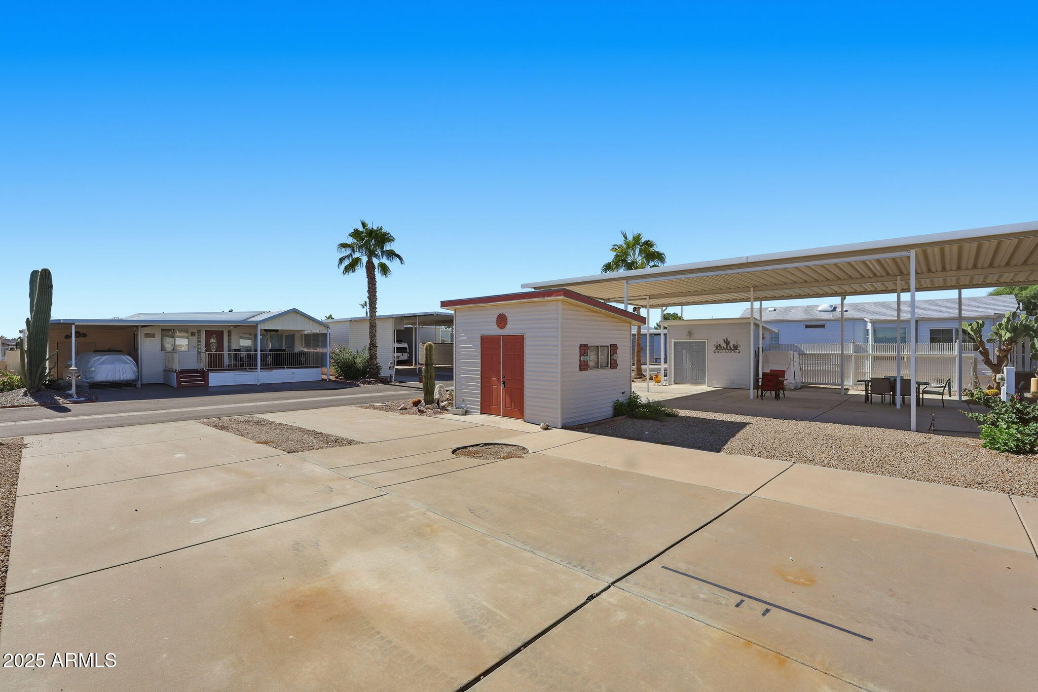 17200 West Bell Road, Unit 1270 Surprise, AZ 85374 - Photo 5 of 15 a front view of a house with a yard