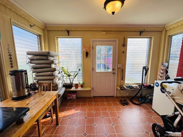 186-22 Avon Road Queens, NY 11432 - Photo 12 of 23 a room with gym equipment and a window