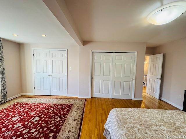 186-22 Avon Road Queens, NY 11432 - Photo 18 of 23 a bedroom with bed and walk in closet