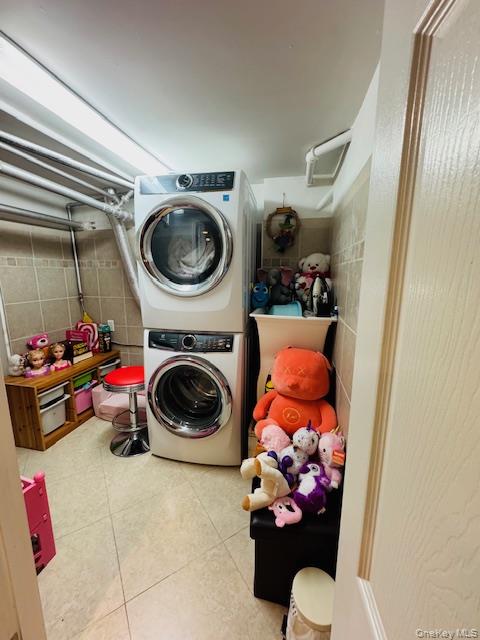 186-22 Avon Road Queens, NY 11432 - Photo 20 of 23 a utility room with mirror and shelf