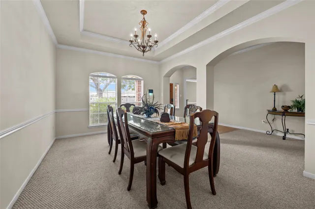 a view of a livingroom with furniture and a chair