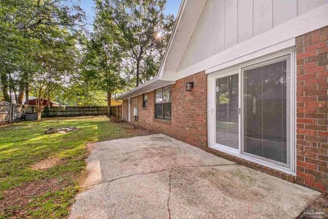 a view of backyard with green space
