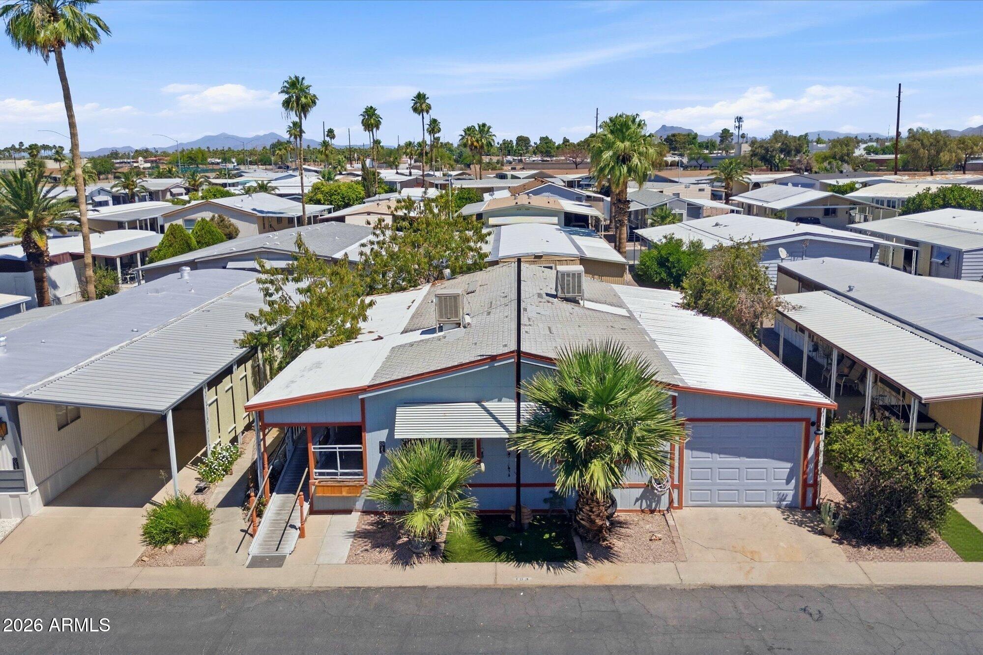 205 South Higley Road, Unit 183 Mesa, AZ 85206 - Photo 6 of 30 a picture of houses with outdoor space