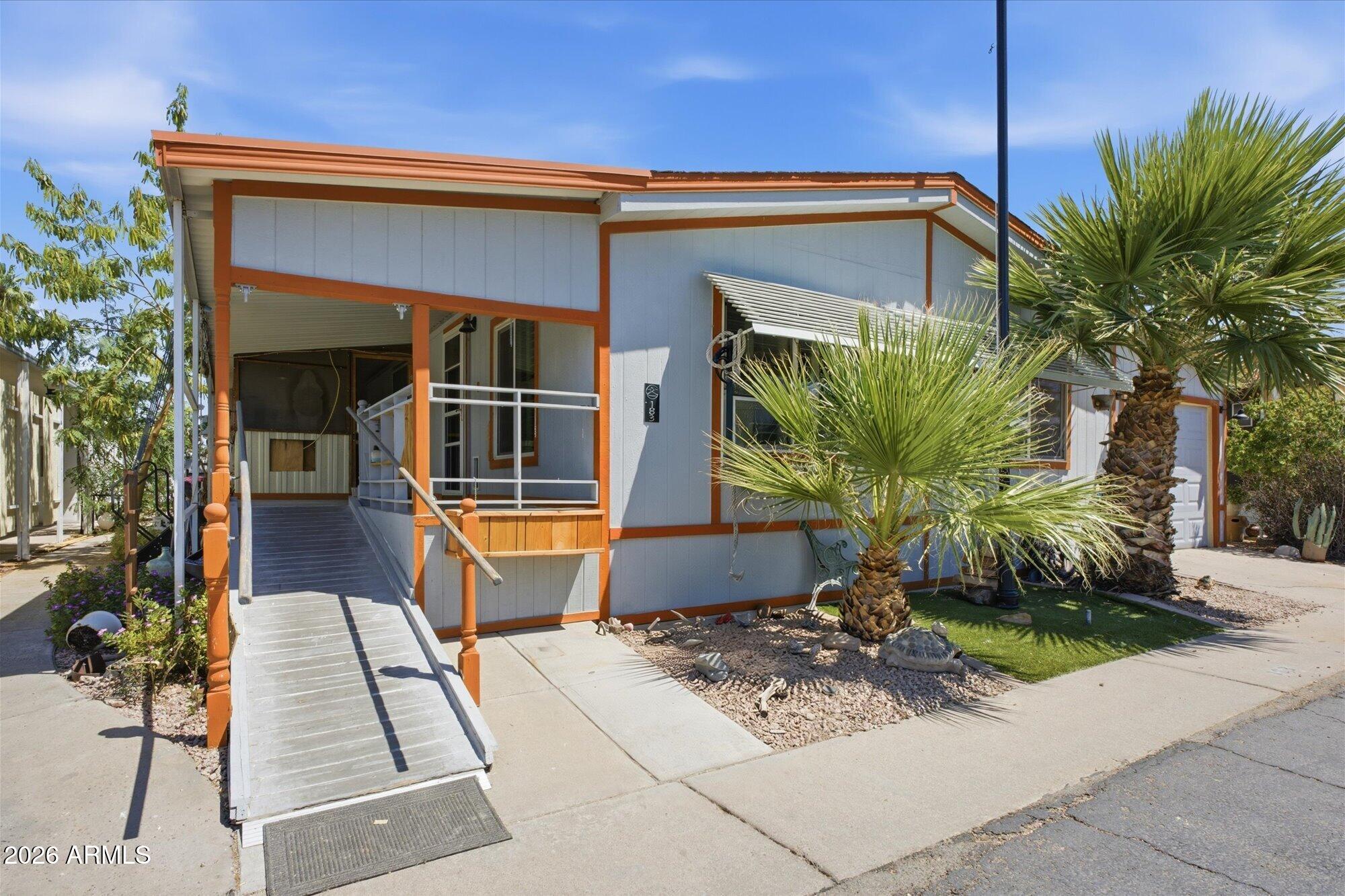 205 South Higley Road, Unit 183 Mesa, AZ 85206 - Photo 7 of 30 a house view with a outdoor space