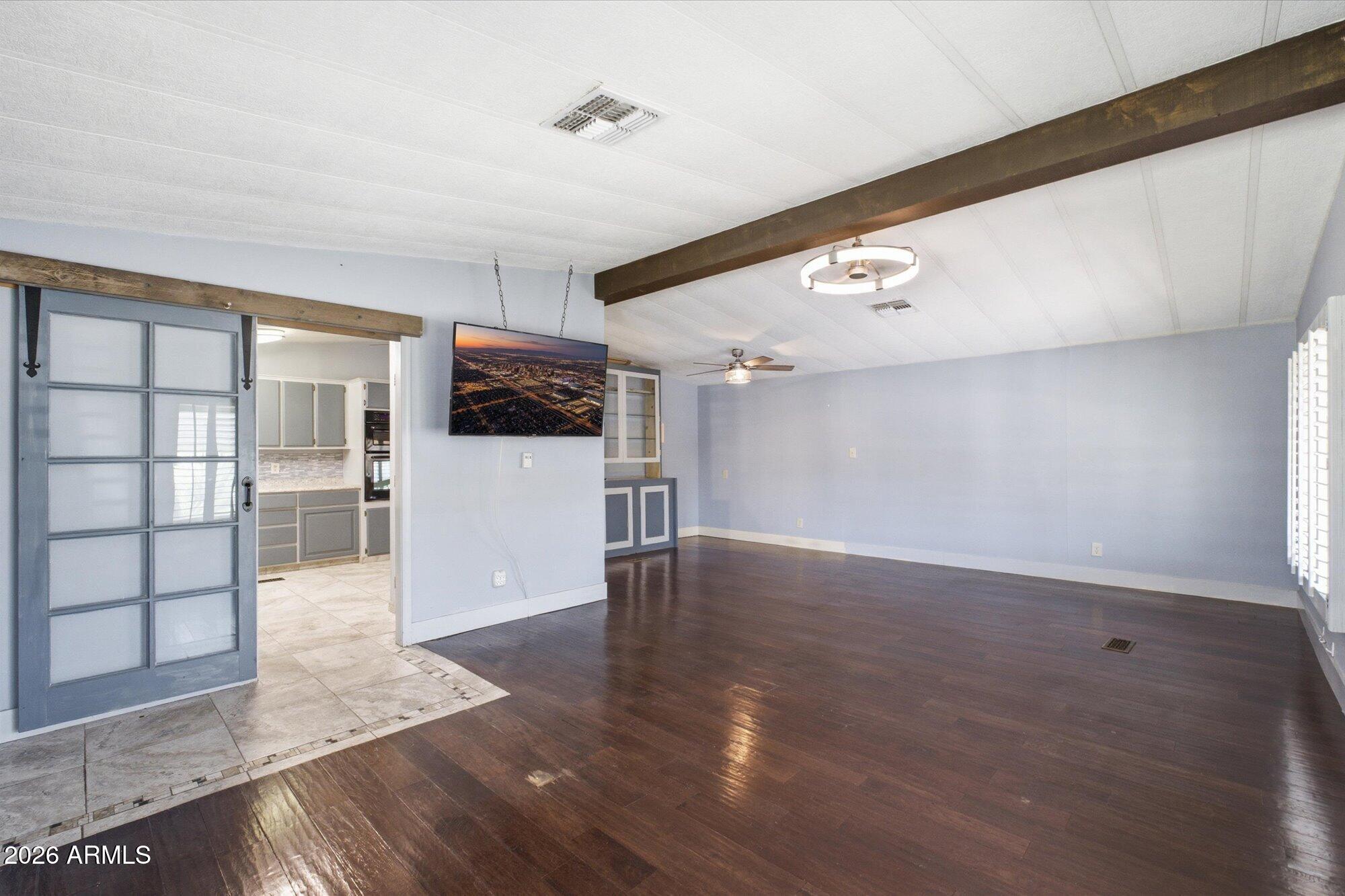 205 South Higley Road, Unit 183 Mesa, AZ 85206 - Photo 8 of 30 a view or kitchen with microwave and refrigerator