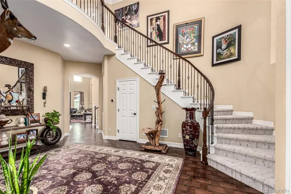 a view of entryway with livingroom and furniture