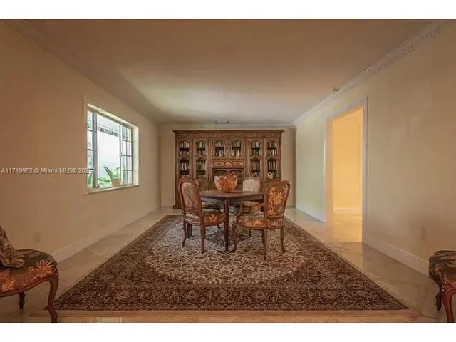 a large bathroom with a tub sink shower and mirror