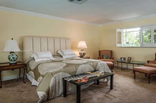 a view of swimming pool with a patio