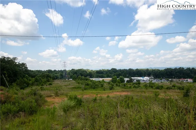 a view of a lake and green space