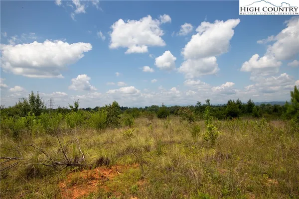 a view of a lake and mountain in the back