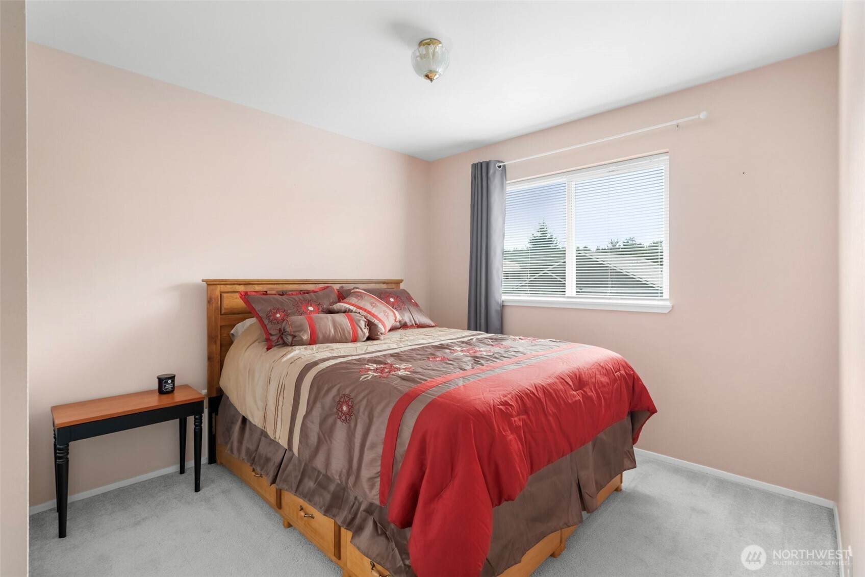 1205 195th Street Long Beach, WA 98631 - Photo 17 of 36 a bedroom with a bed and window