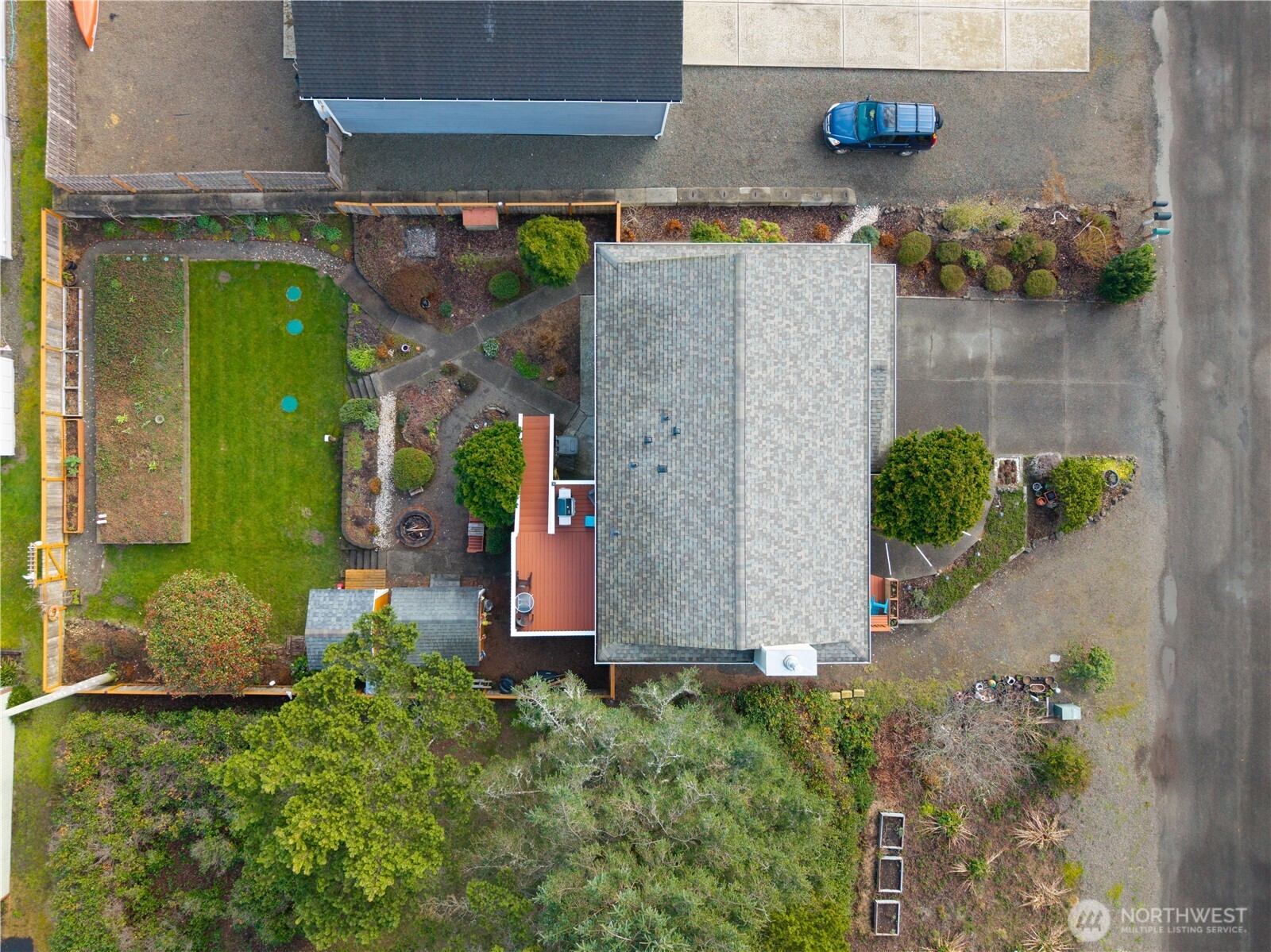 1205 195th Street Long Beach, WA 98631 - Photo 35 of 36 an aerial view of a house with a yard
