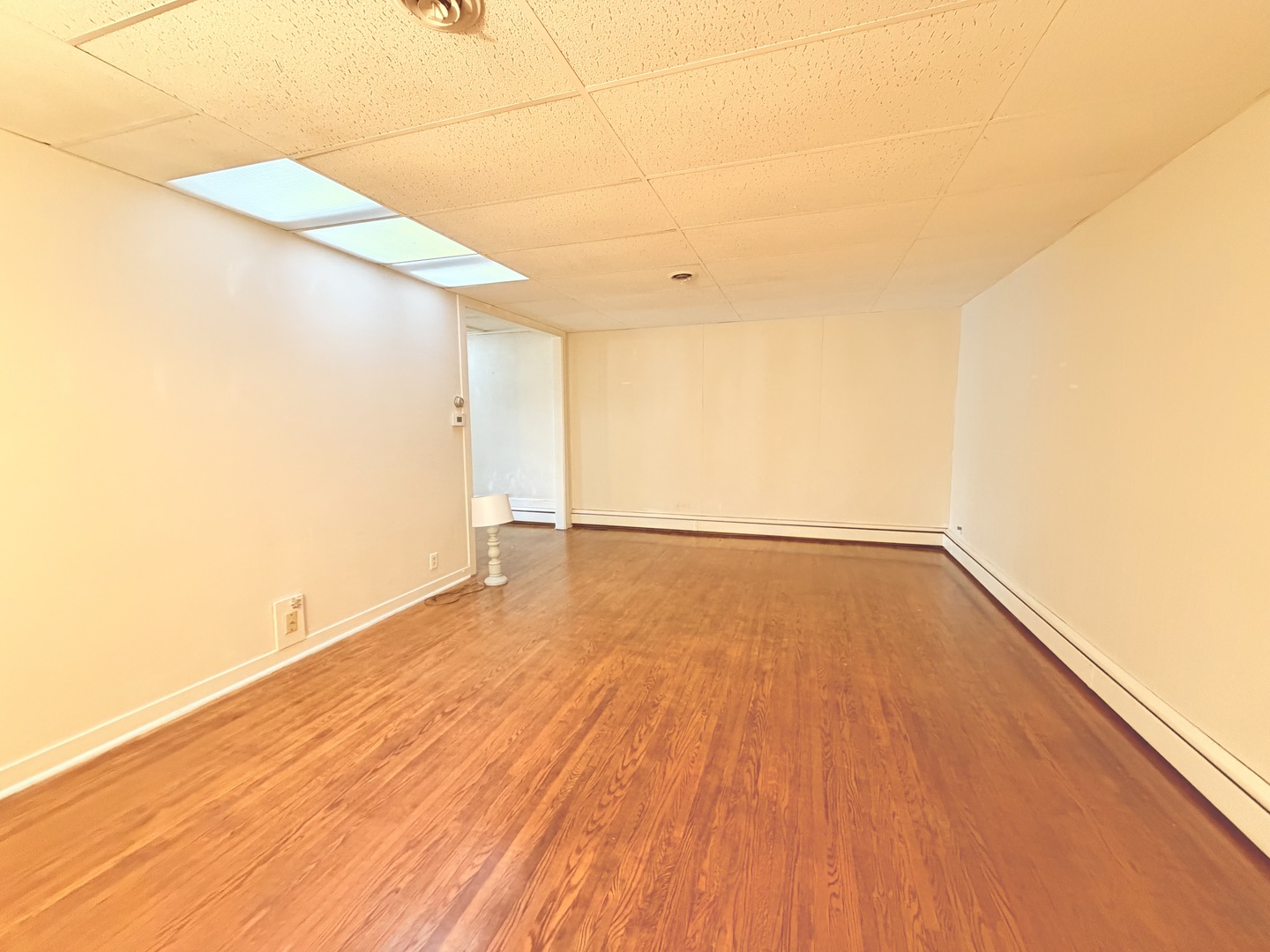 134 West State Street Sycamore, IL 60178 - Photo 40 of 43 a view of empty room with wooden floor