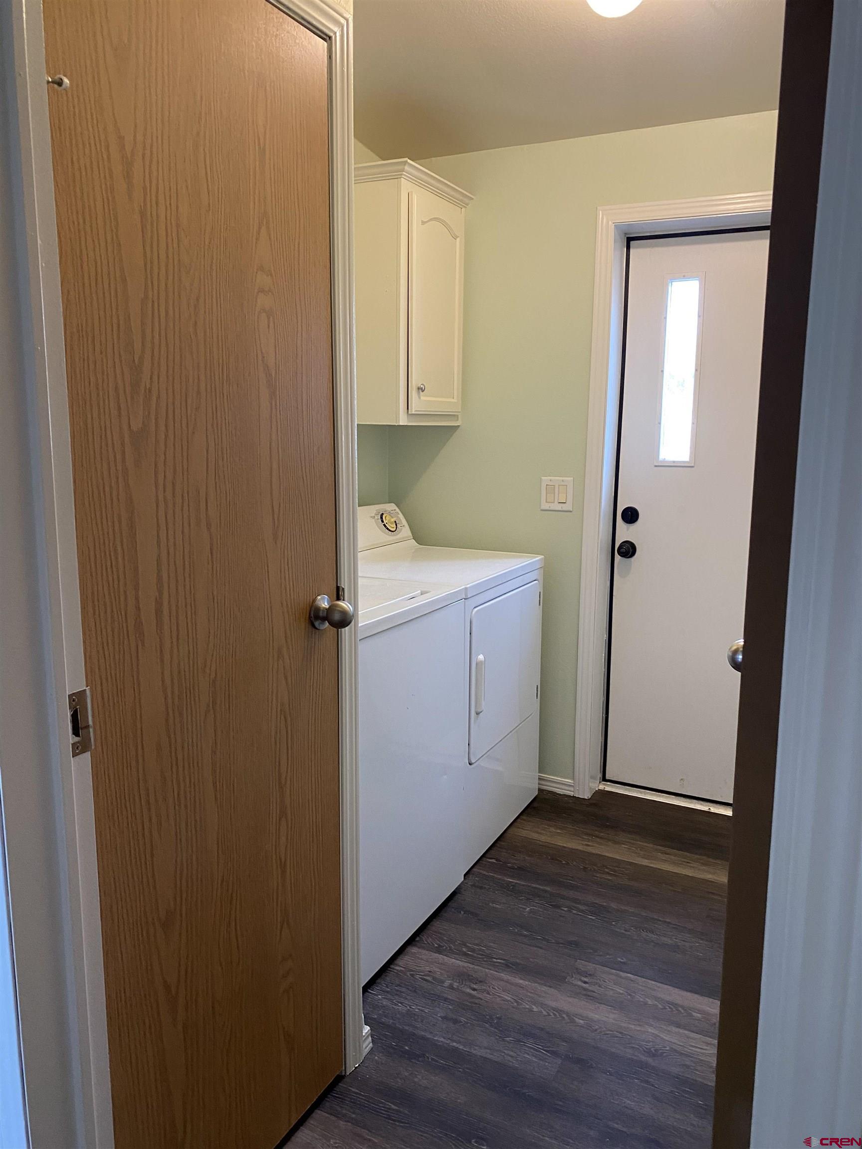 7156 Peach Valley Road Delta, CO 81416 - Photo 30 of 33 a view of a room with wooden floor