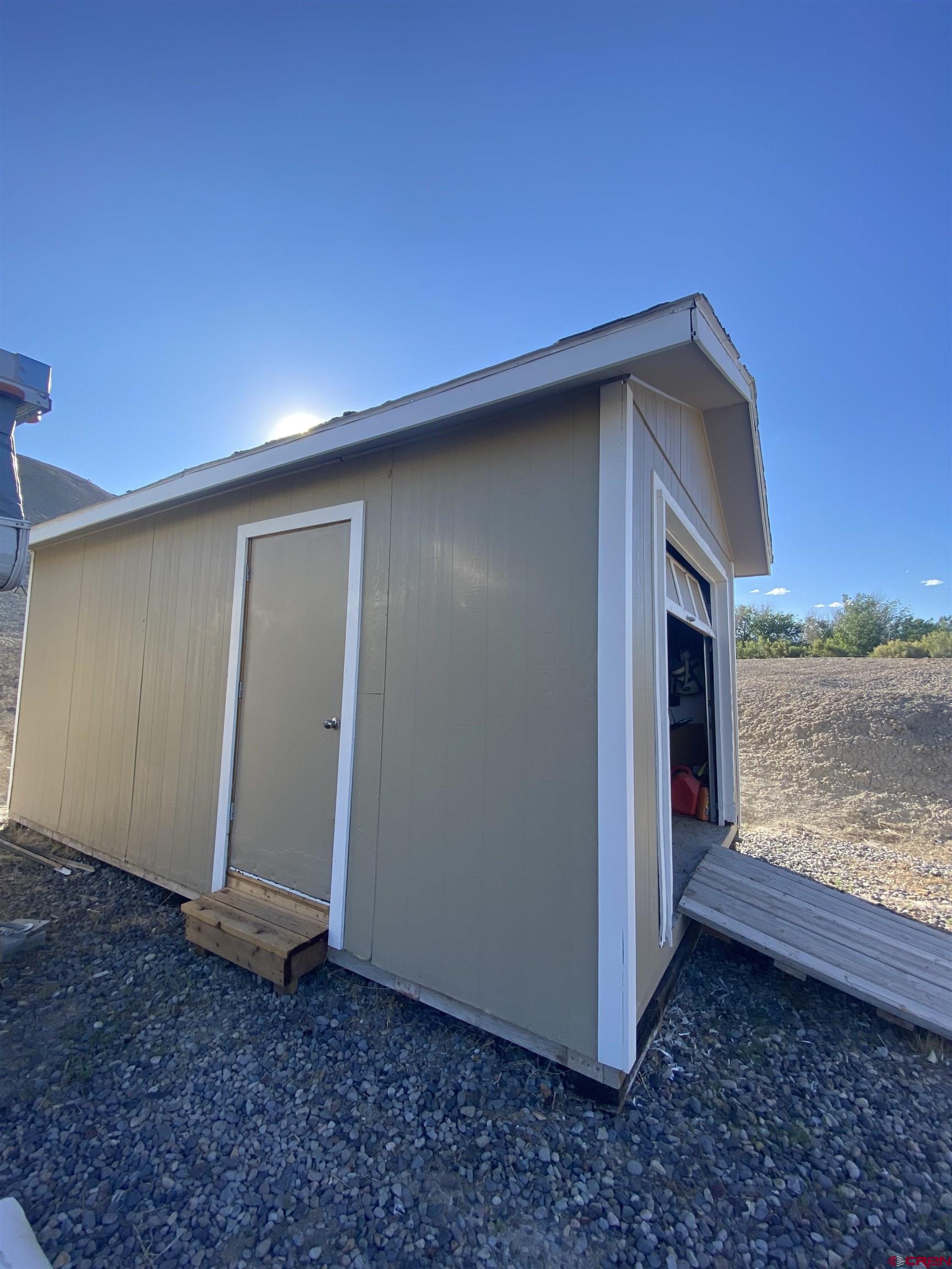 7156 Peach Valley Road Delta, CO 81416 - Photo 5 of 33 a backyard of a house