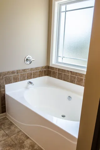 a bathroom with a toilet a sink and a shower