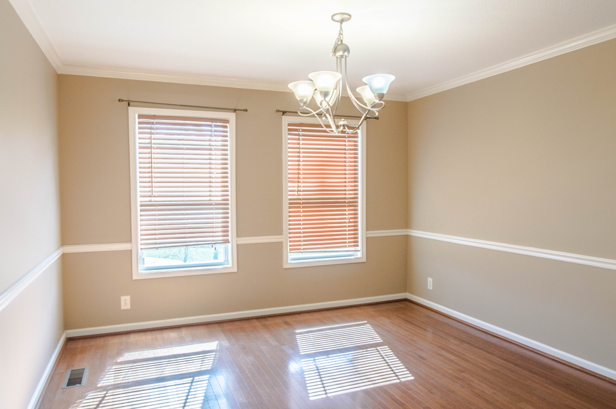 1005 Ishee Drive Clarksville, TN 37042 - Photo 8 of 20 a view of an empty room with wooden floor and a window