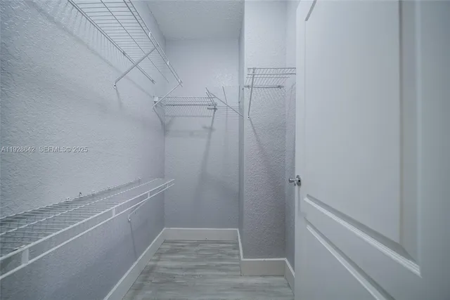 a view of small space with racks on the wall