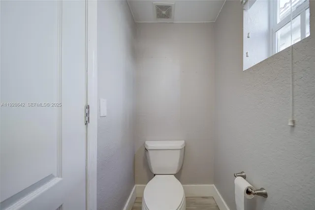 a bathroom with a toilet