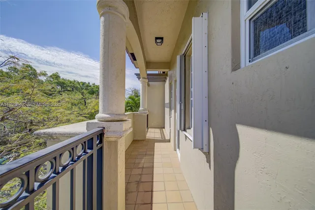 a view of balcony with furniture