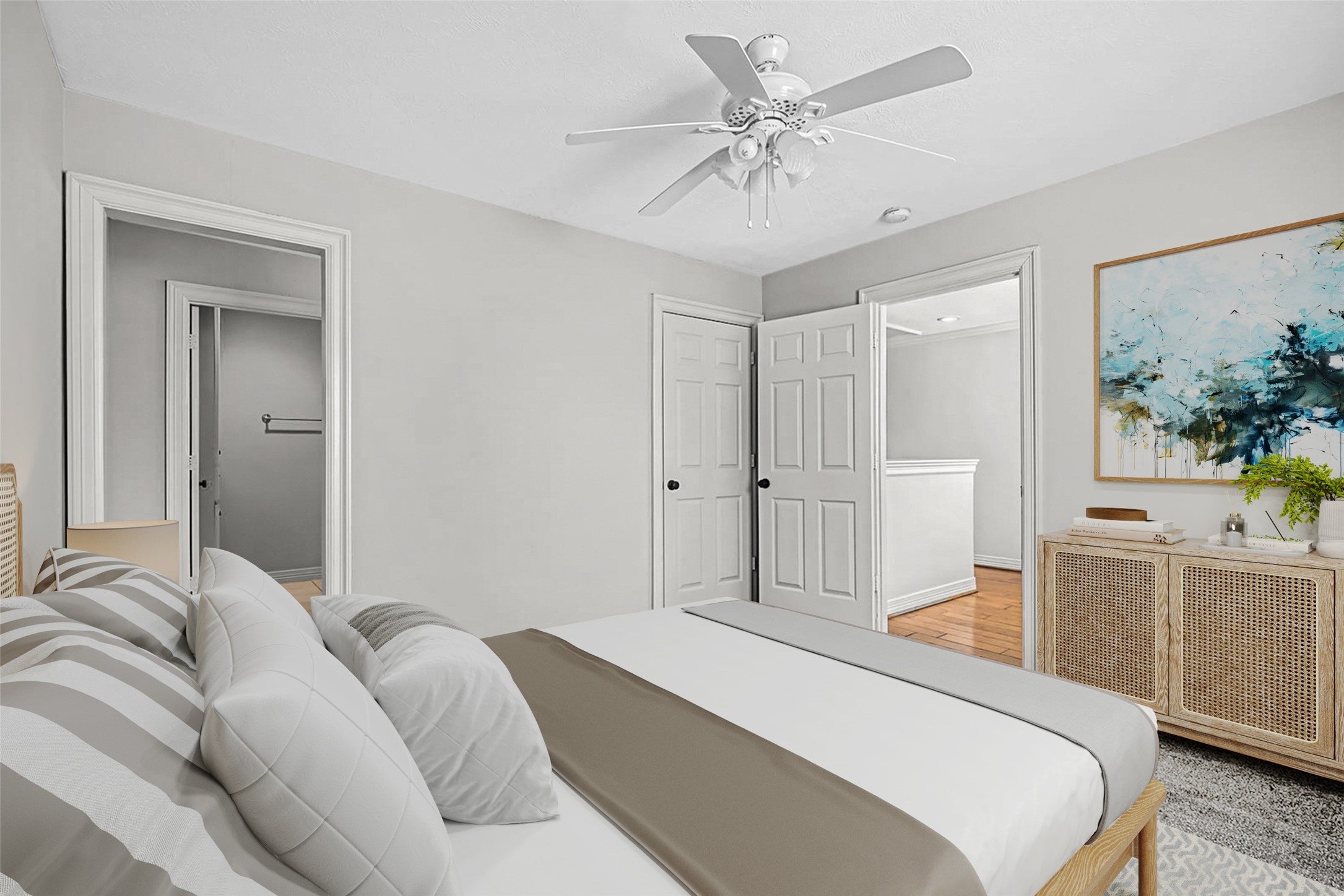 806 East 29th Street Houston, TX 77009 - Photo 20 of 30 a bedroom with a bed and a chandelier