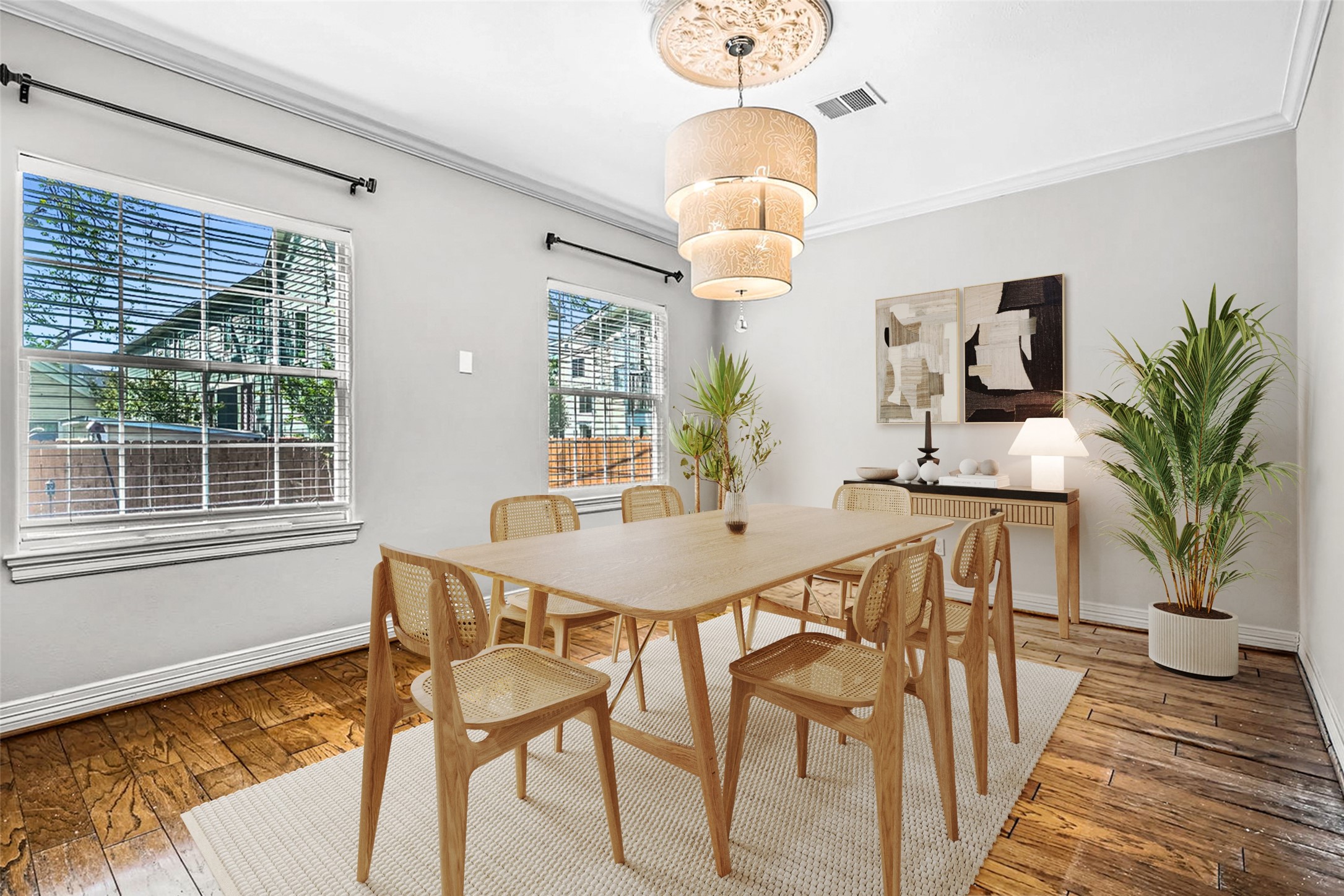 806 East 29th Street Houston, TX 77009 - Photo 9 of 30 a view of a dining room with furniture window and wooden floor