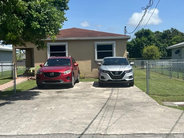 a house view with a outdoor space