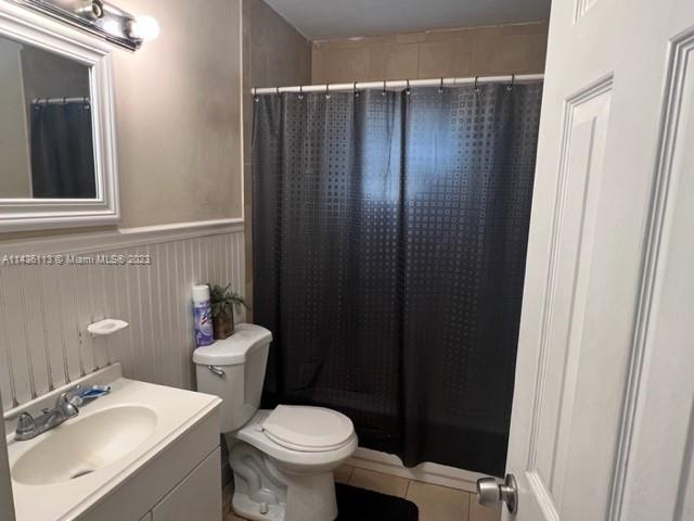 Goulds Miami, FL 33170 - Photo 13 of 18 a bathroom with a sink a toilet and shower