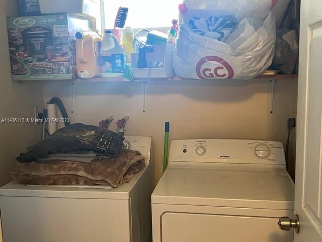 Goulds Miami, FL 33170 - Photo 16 of 18 a utility room with dryer and washer