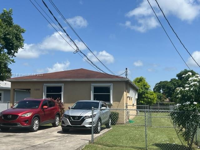 Goulds Miami, FL 33170 - Photo 2 of 18 a front view of a house with patio