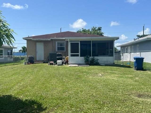 Goulds Miami, FL 33170 - Photo 4 of 18 a front view of a house with garden