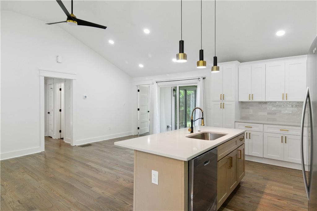 3435 Maplehurst Drive Decatur, GA 30032 - Photo 16 of 39 a kitchen with a sink stove and cabinets