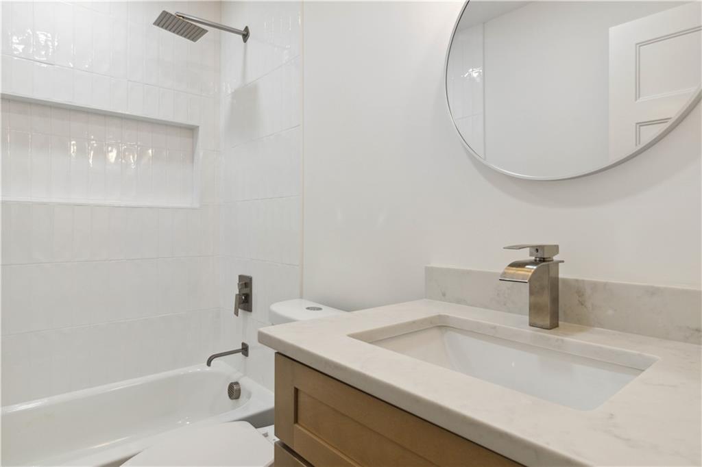 3435 Maplehurst Drive Decatur, GA 30032 - Photo 23 of 39 a bathroom with a sink and a mirror