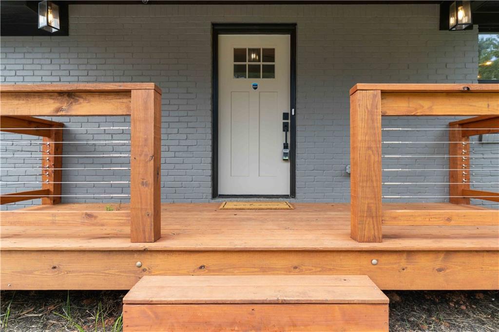 3435 Maplehurst Drive Decatur, GA 30032 - Photo 3 of 39 a bathroom with a granite countertop sink and a mirror