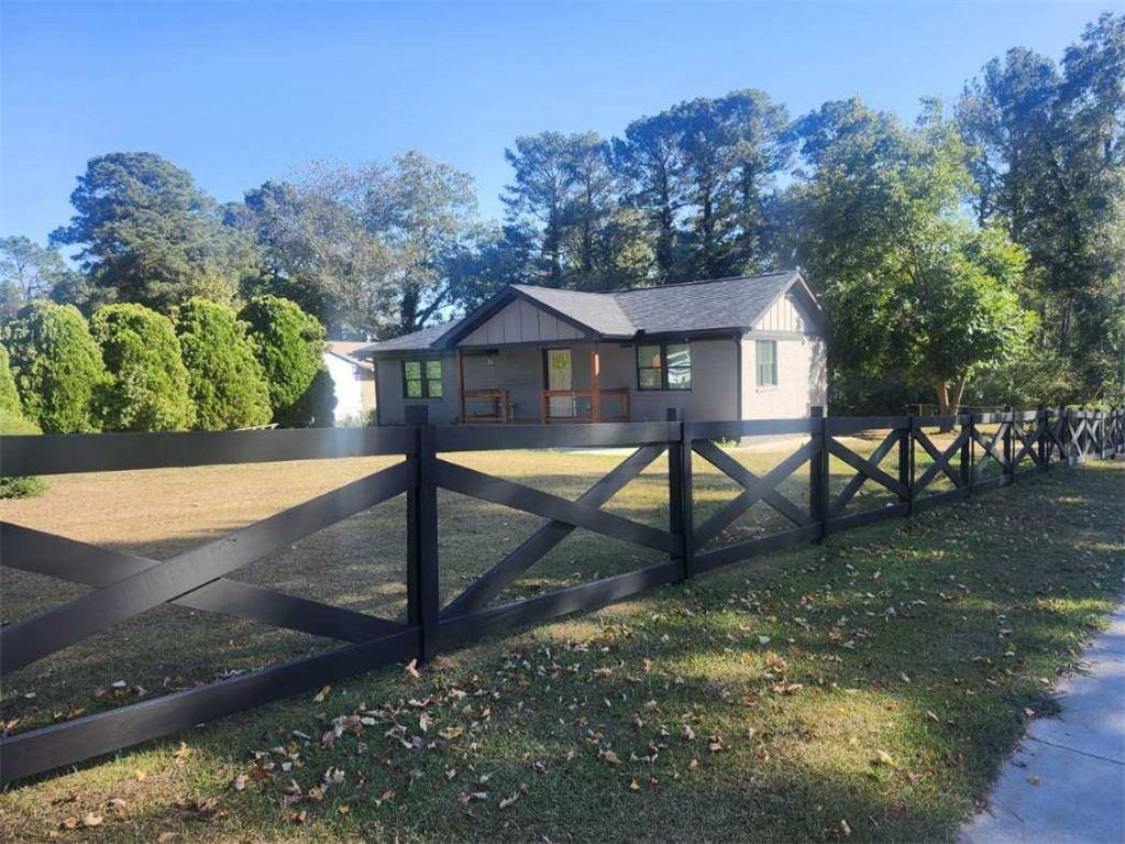 3435 Maplehurst Drive Decatur, GA 30032 - Photo 36 of 39 a view of a house with backyard and sitting area