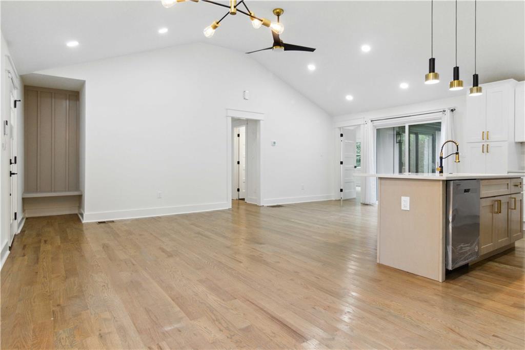 3435 Maplehurst Drive Decatur, GA 30032 - Photo 6 of 39 a view of a kitchen with a sink and cabinet with wooden floor