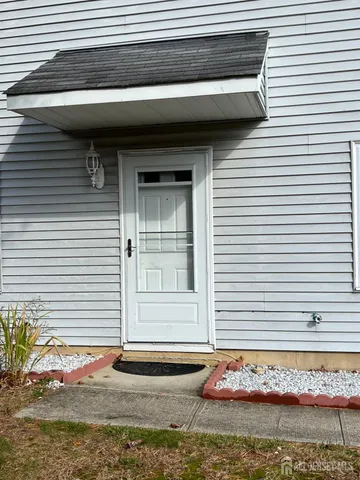 a front view of a house with a garage