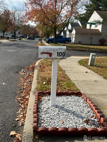 a view of a house with a street