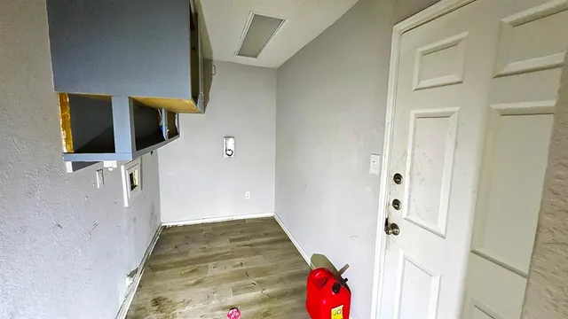 a bathroom with a tub sink and a mirror