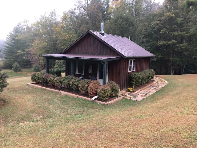 757 Roberson Mill Road Southeast Floyd, VA 24091 - Photo 1 of 23 a front view of a house with a yard