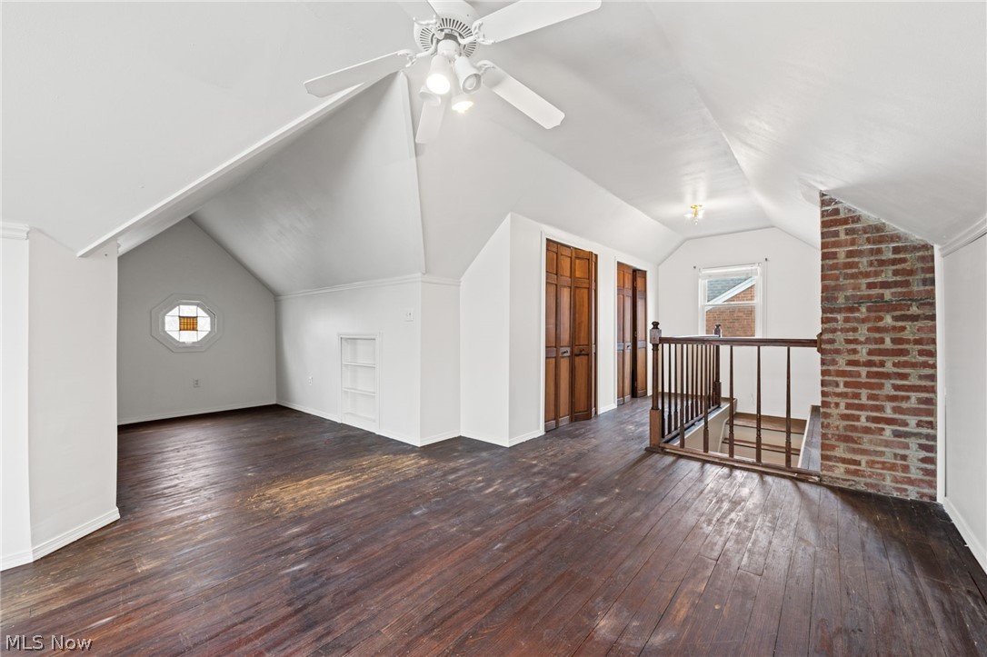 2513 Ralph Avenue Cleveland, OH 44109 - Photo 8 of 14 Additional living space with dark wood-type flooring and a healthy amount of sunlight
