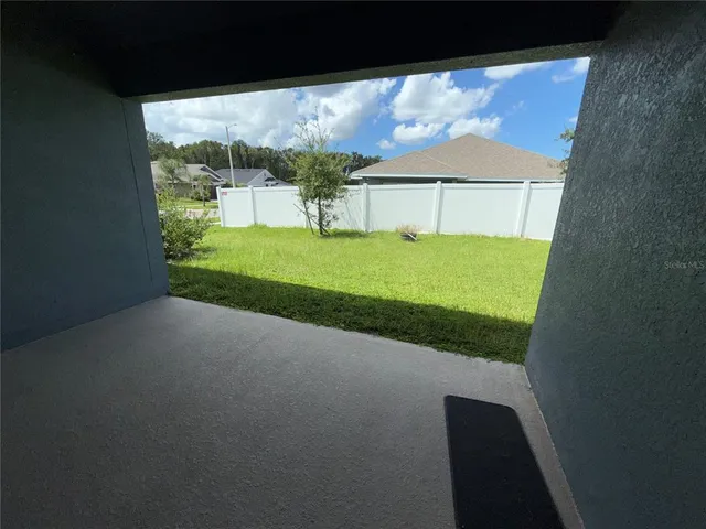 a house view with a garden space